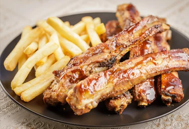 Sticky pork ribs with fries at Niom Bistro, Wellington