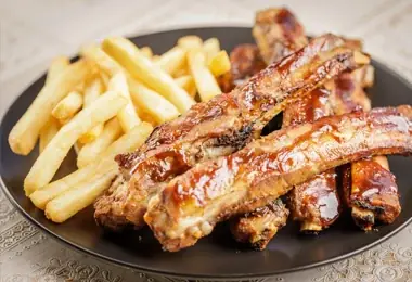 Sticky pork ribs with fries at Niom Bistro, Newtown